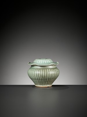 Lot 397 - A LONGQUAN CELADON RIBBED JAR AND COVER, YUAN DYNASTY
