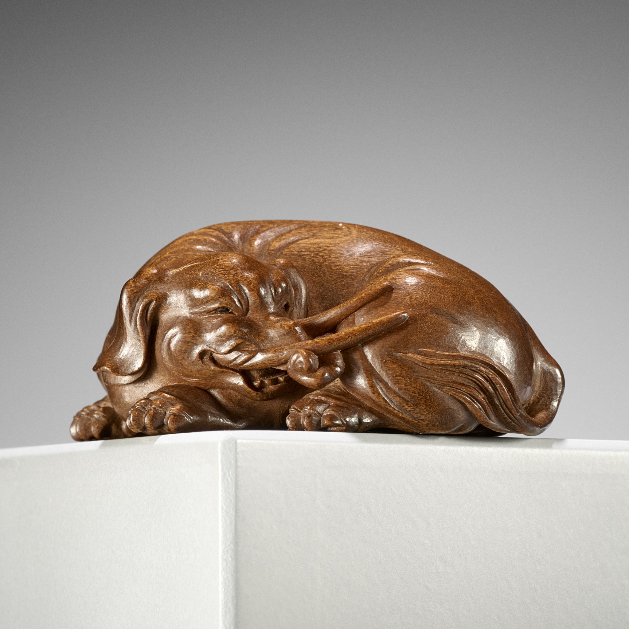 Lot 256 - TAKAHASHI HOUN: AN IMPORTANT WOOD NETSUKE OF
