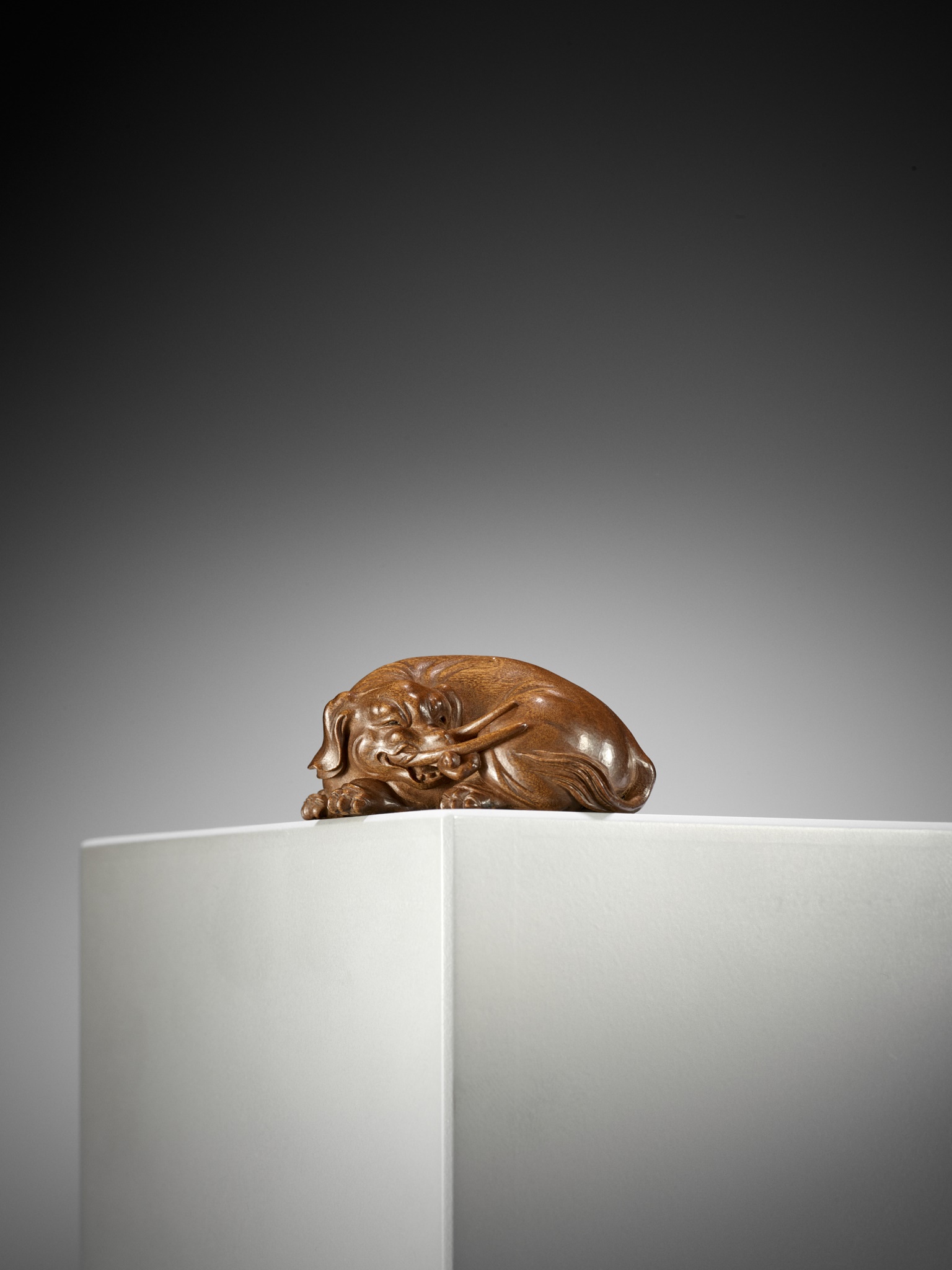 Lot 256 - TAKAHASHI HOUN: AN IMPORTANT WOOD NETSUKE OF
