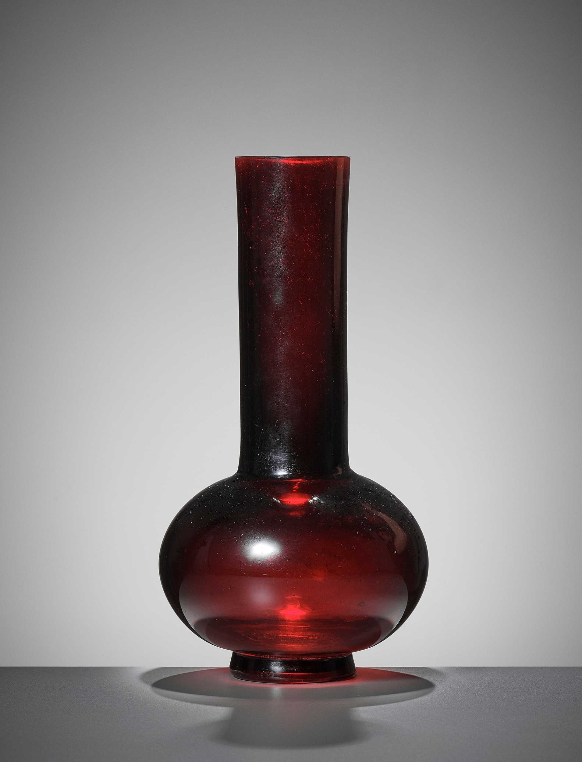 Lot 6 - A RUBY-RED GLASS BOTTLE VASE, QIANLONG MARK AND PERIOD