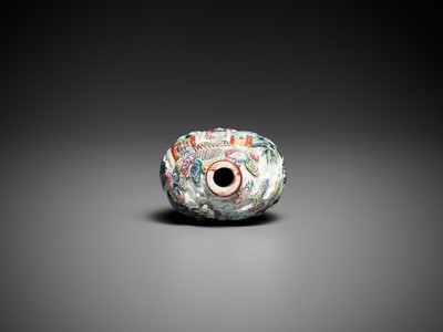 AN IMPERIAL MOLDED AND ENAMELED PORCELAIN SNUFF BOTTLE, JIAQING MARK AND PERIOD