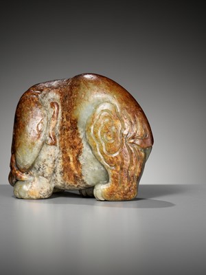 Lot 41 - A CELADON AND RUSSET JADE FIGURE OF AN ELEPHANT, MING DYNASTY