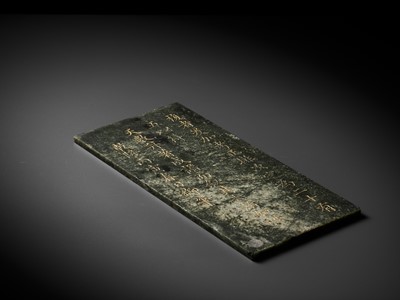 Lot 59 - AN IMPERIAL ‘YUNLONG’ BOOK COVER, INSCRIBED BY EMPEROR QIANLONG, CARVED SPINACH-GREEN JADE, DATED BINGYIN YEAR, 1746