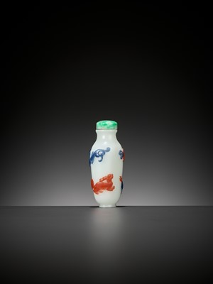 Lot 617 - A TWO-COLOR OVERLAY ‘FOUR GUARDIANS’ WHITE GLASS SNUFF BOTTLE, 19TH CENTURY
