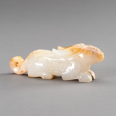 AN ARCHAISTIC JADE FIGURE OF A RABBIT