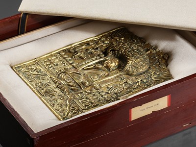 Lot 157 - A LARGE AND IMPORTANT BUDDHIST VOTIVE PLAQUE, GILT COPPER REPOUSSÉ, EARLY TANG DYNASTY