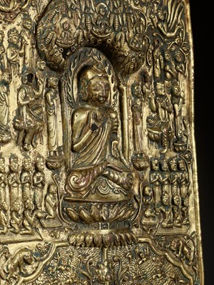 Lot 11 - A LARGE AND IMPORTANT BUDDHIST VOTIVE PLAQUE, GILT COPPER REPOUSSÉ, EARLY TANG DYNASTY