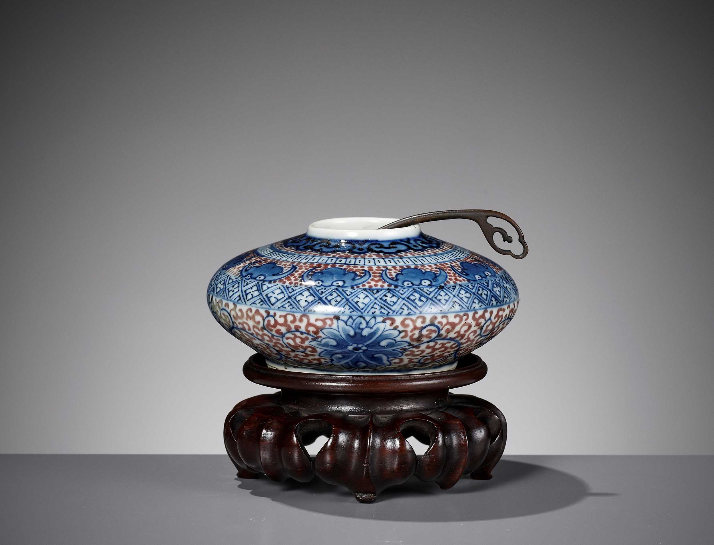 A PORCELAIN WATER POT, WITH MATCHING BRONZE SPOON AND WOOD STAND, QING...