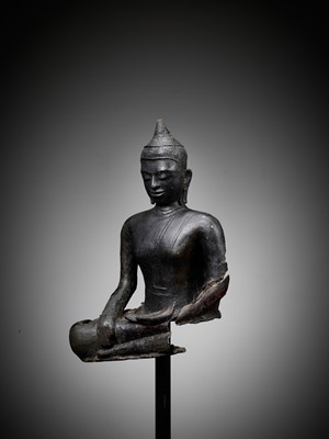 Lot 683 - AN EARLY BRONZE FRAGMENT OF BUDDHA, PYU KINGDOM