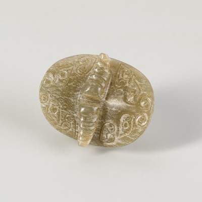 AN ARCHAISTIC JADE ‘TAOTIE’ CARVING, QING OR EARLIER