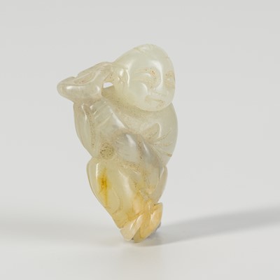 A SMALL JADE FIGURE OF A MONK, LATE QING