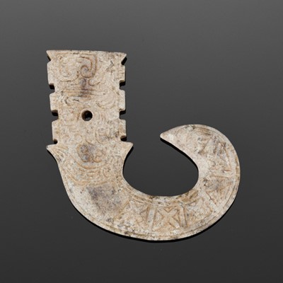 AN ARCHAISTIC JADE ‘HOOK’ PENDANT