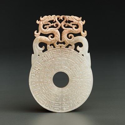 AN ARCHAISTIC WHITE JADE BI DISC PENDANT WITH DRAGONS