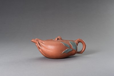 Lot 947 - A YIXING ‘BUDDHA HAND CITRUS’ TEAPOT AND COVER, 20TH CENTURY