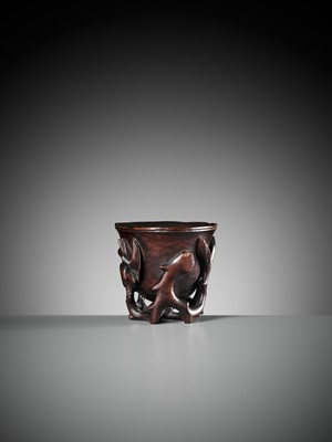 Lot 284 - A ‘MAGNOLIA’ ZITAN LIBATION CUP, CHINA, 17TH CENTURY