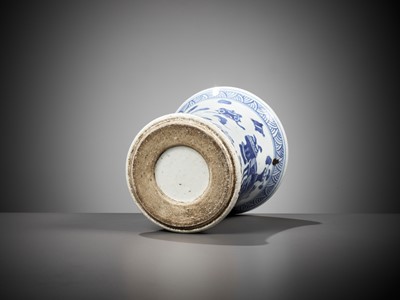 Lot 81 - A BLUE AND WHITE WAISTED ‘ANTIQUE TREASURES’ BRUSHPOT, BITONG, EARLY QING DYNASTY