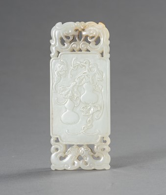 Lot 197 - A WHITE JADE ‘DOUBLE GOURD’ PLAQUE, 1930s
