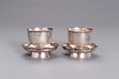 Lot 24 - A PAIR OF SILVER CUPS WITH MATCHING SAUCERS