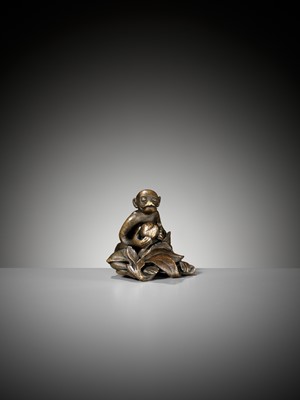 Lot 498 - A ‘MONKEY AND PEACH’ BRONZE WEIGHT, MING DYNASTY