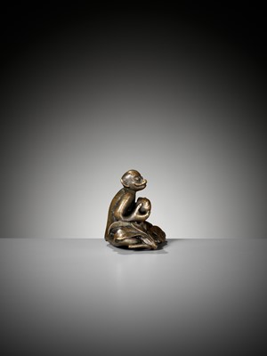 Lot 498 - A ‘MONKEY AND PEACH’ BRONZE WEIGHT, MING DYNASTY
