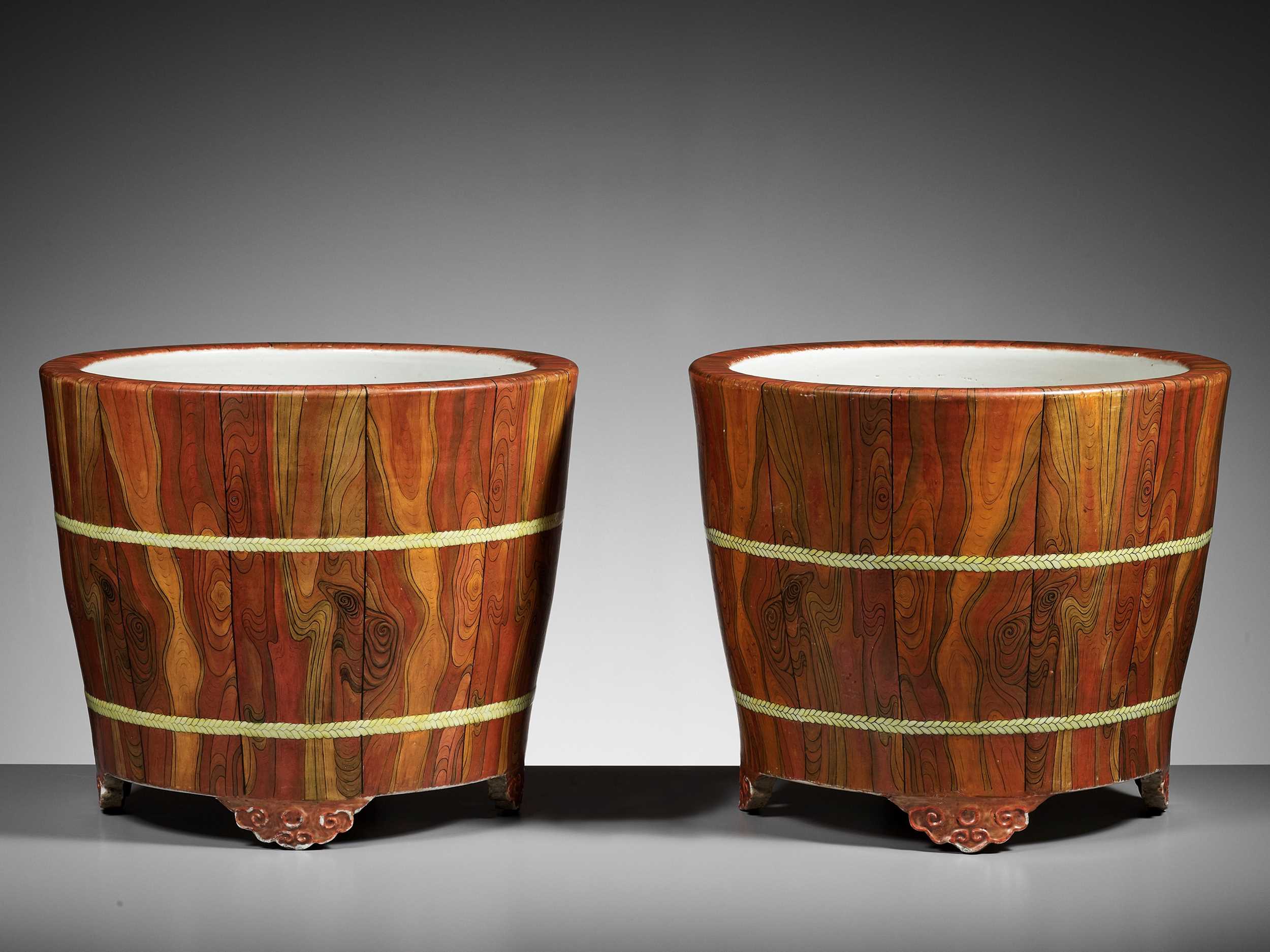 A PAIR OF LARGE ‘FAUX-BOIS’ JARDINIÈRES, IMITATING HUANGHUALI, QIANLONG MARKS AND PROBABLY OF THE PERIOD (circa 1736-1795)