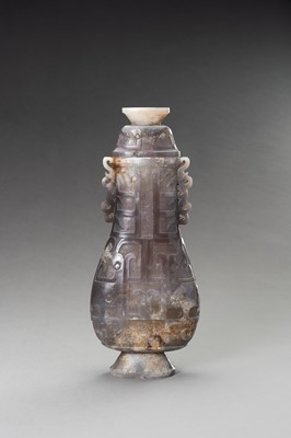 Lot 255 - A LILAC-GRAY JADE ARCHAISTIC VASE AND COVER, HU, 20TH CENTURY
