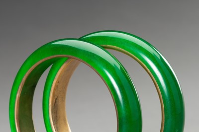 Lot 258 - A PAIR OF GLASS IN IMITATION OF JADEITE BANGLES