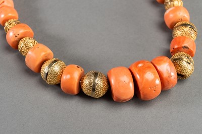 Lot 296 - A MOMO CORAL AND GILT SILVER NECKLACE