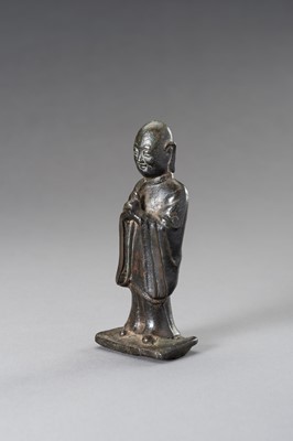 Lot 104 - A BRONZE FIGURE OF A MONK, QING DYNASTY