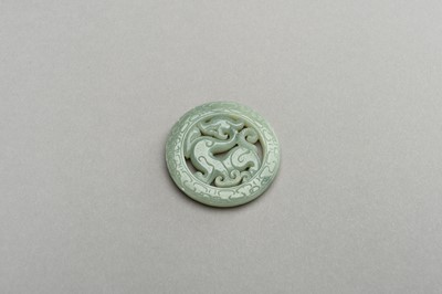 Lot 242 - AN ARCHAISTIC SEA-GREEN JADE PENDANT, REPUBLIC PERIOD OR LATER