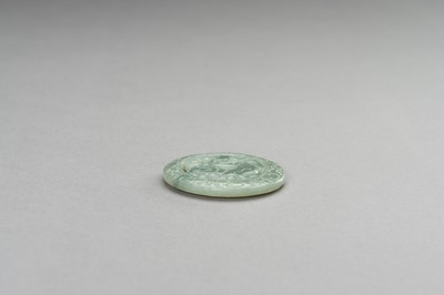 Lot 242 - AN ARCHAISTIC SEA-GREEN JADE PENDANT, REPUBLIC PERIOD OR LATER