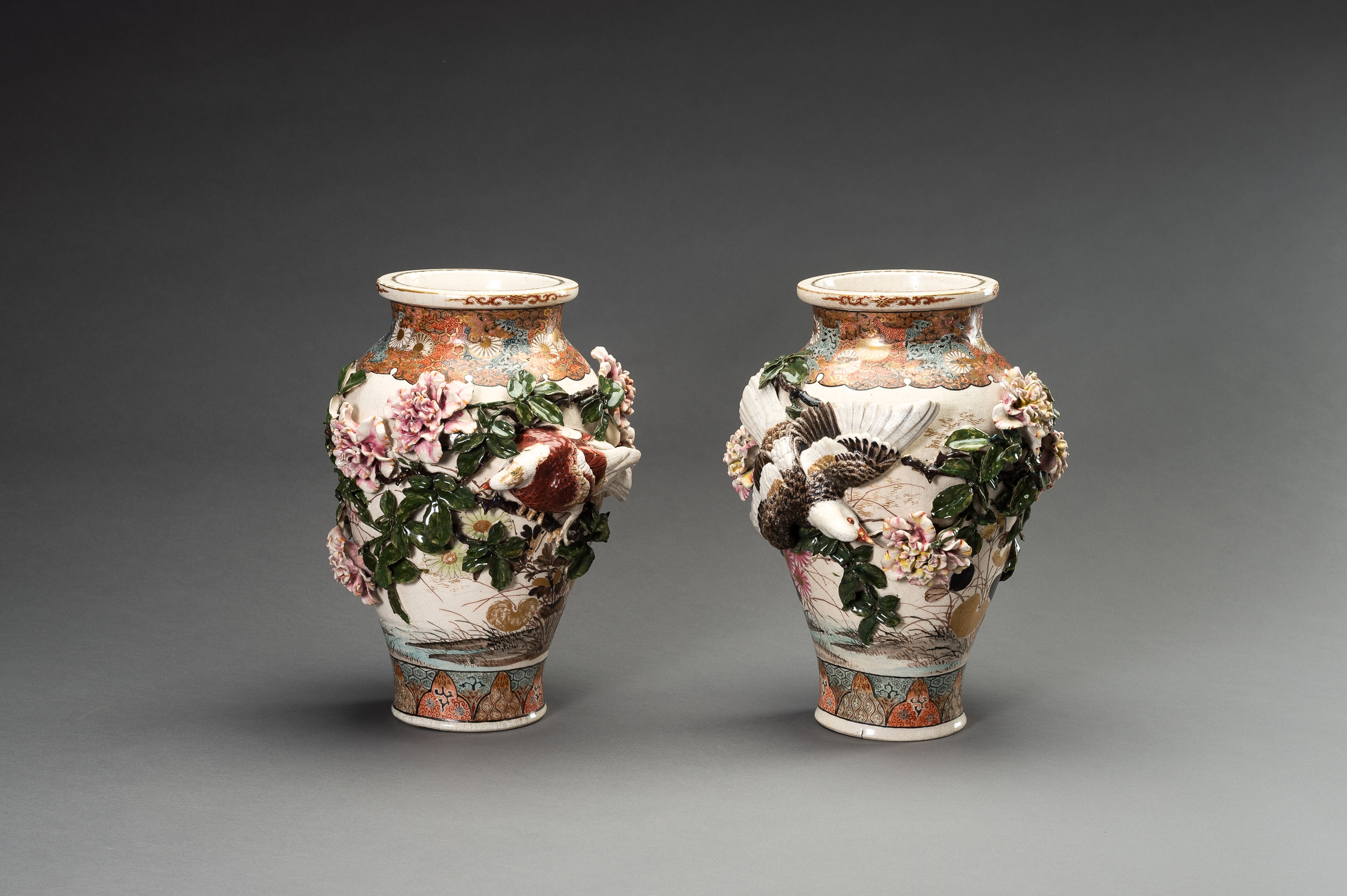 Lot 1115 - A PAIR OF KOZAN STYLE RELIEF-MOULDED