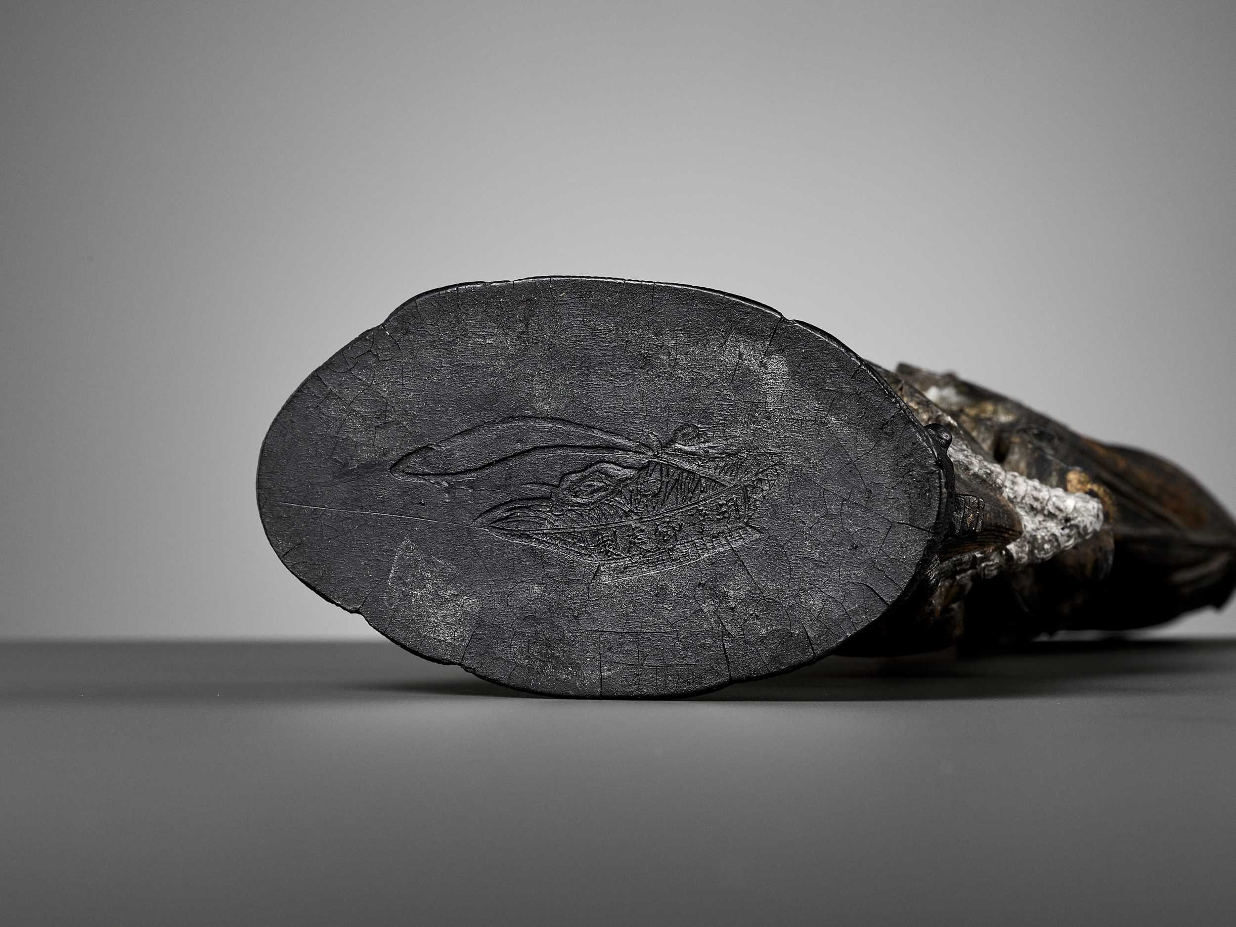 Lot 35 AN INK CAKE DEPICTING LAN CAIHE, 18TH CENTURY