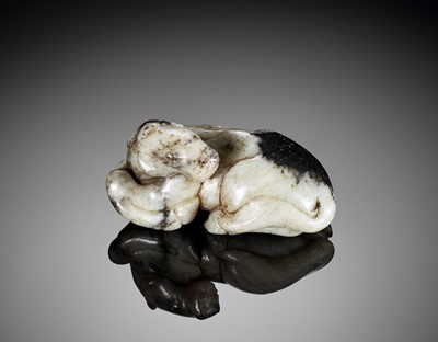 A GRAY AND BLACK NEPHRITE JADE FIGURE OF A HORSE, MING DYNASTY