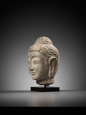 Lot 153 - AN EXCEPTIONAL LIMESTONE HEAD OF BUDDHA, NORTHERN QI DYNASTY