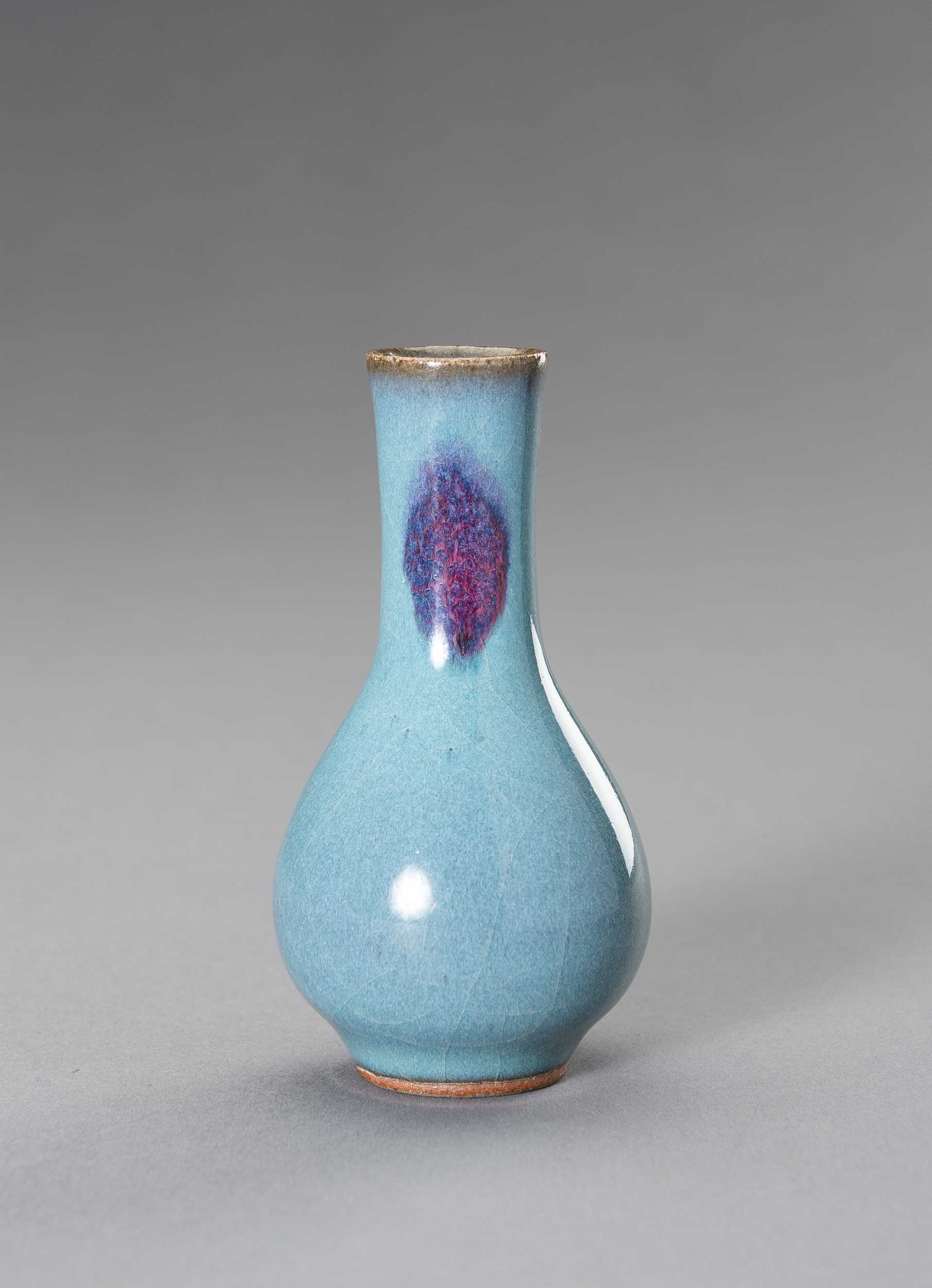 Lot 737 - A MINIATURE JUN PURPLE-SPLASHED PORCELAIN BOTTLE VASE, REPUBLIC PERIOD