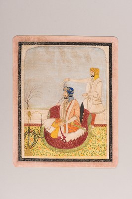 Lot 1323 - AN INDIAN MINIATURE PAINTING OF A RULER SMOKING A HUQQA