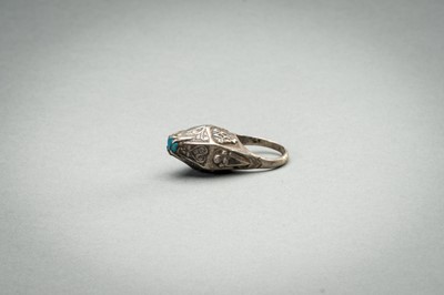 Lot 1005 - A TURQUOISE-MATRIX-SET SILVER RING, 19TH CENTURY