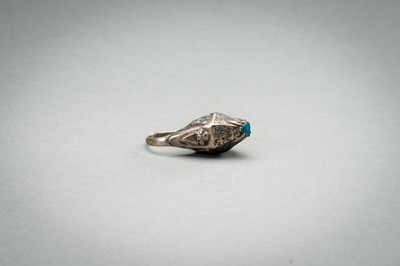 Lot 1005 - A TURQUOISE-MATRIX-SET SILVER RING, 19TH CENTURY