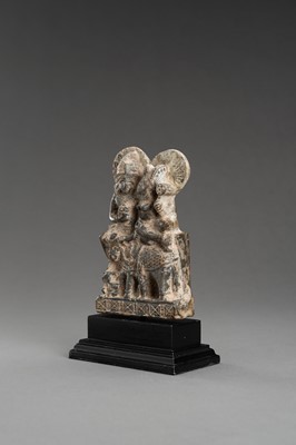 Lot 903 - A GRAY STONE STATUE OF UMA-MAHESHWARA