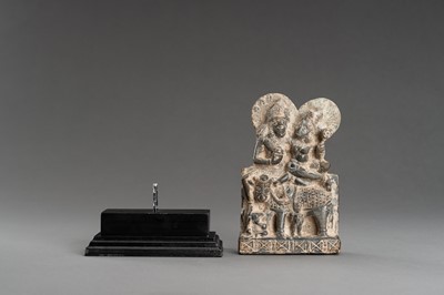 Lot 903 - A GRAY STONE STATUE OF UMA-MAHESHWARA