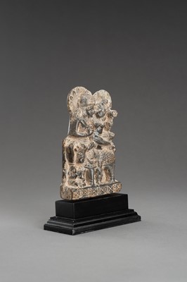 Lot 903 - A GRAY STONE STATUE OF UMA-MAHESHWARA