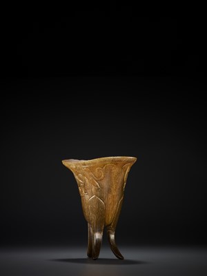 Lot 127 - A RHINOCEROS HORN ARCHAISTIC LIBATION CUP, JUE, EARLY QING DYNASTY