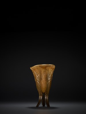 Lot 23 - A RHINOCEROS HORN ARCHAISTIC LIBATION CUP, JUE, EARLY QING DYNASTY