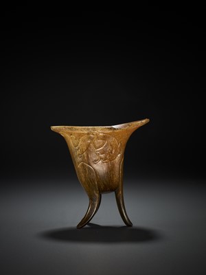 Lot 23 - A RHINOCEROS HORN ARCHAISTIC LIBATION CUP, JUE, EARLY QING DYNASTY