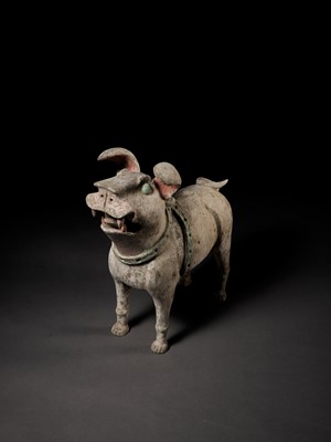 Lot 47 - A MASSIVE PAINTED POTTERY FIGURE OF A GUARDIAN DOG, LATE EASTERN HAN TO SIX DYNASTIES