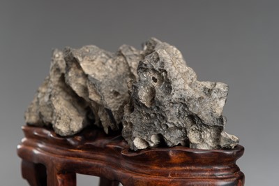 Lot 76 - A GRAY LINGBI SCHOLAR’S ROCK ON FITTED BASE, 19TH CENTURY