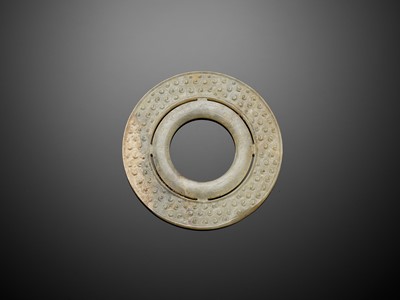 Lot 95 - A JADE DOUBLE DISK, BI, WARRING STATES TO WESTERN HAN DYNASTY