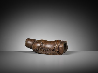 Lot 289 - A CARVED BAMBOO ‘SLEEPING BOY’ PILLOW, QING DYNASTY