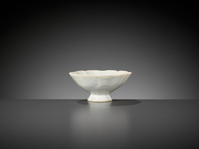 Lot 372 - A SMALL QINGBAI FLORAL CUP, SONG DYNASTY
